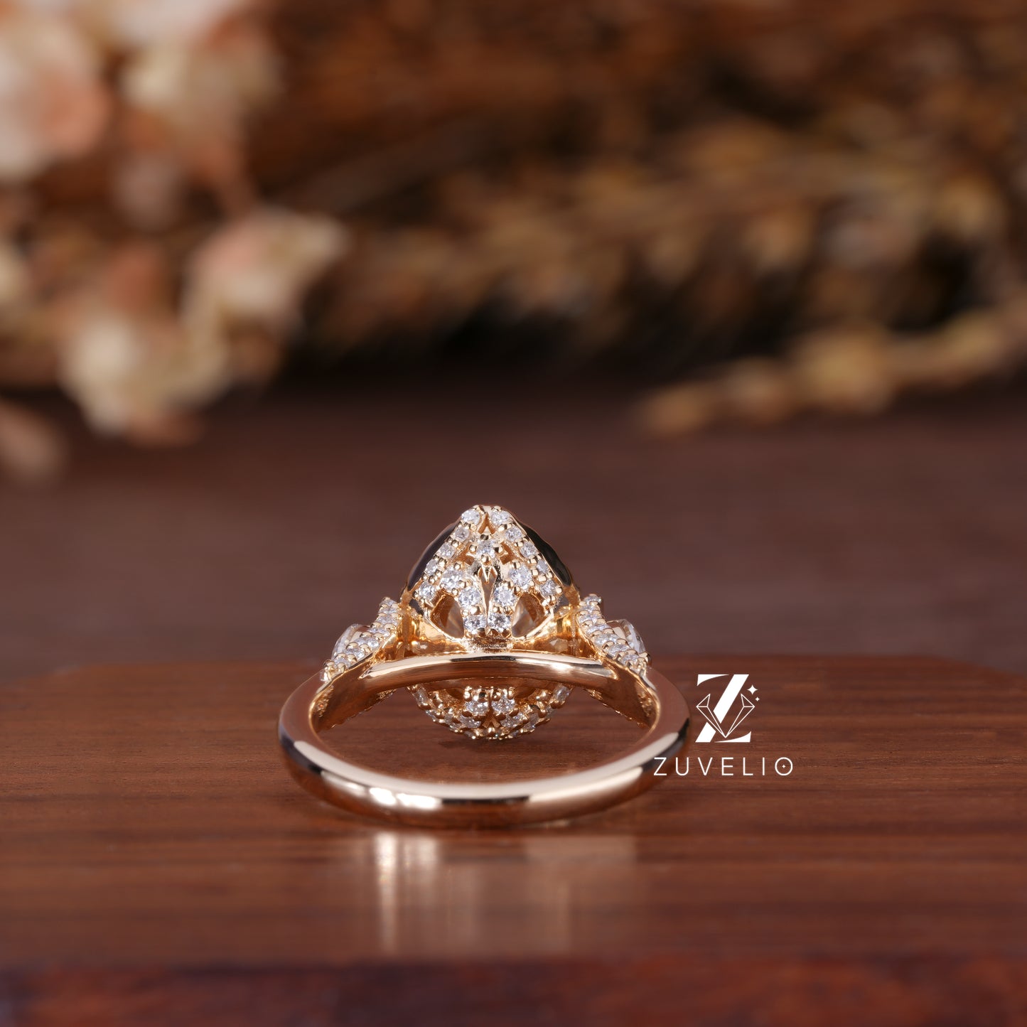 Pear Halo Moissanite Ring