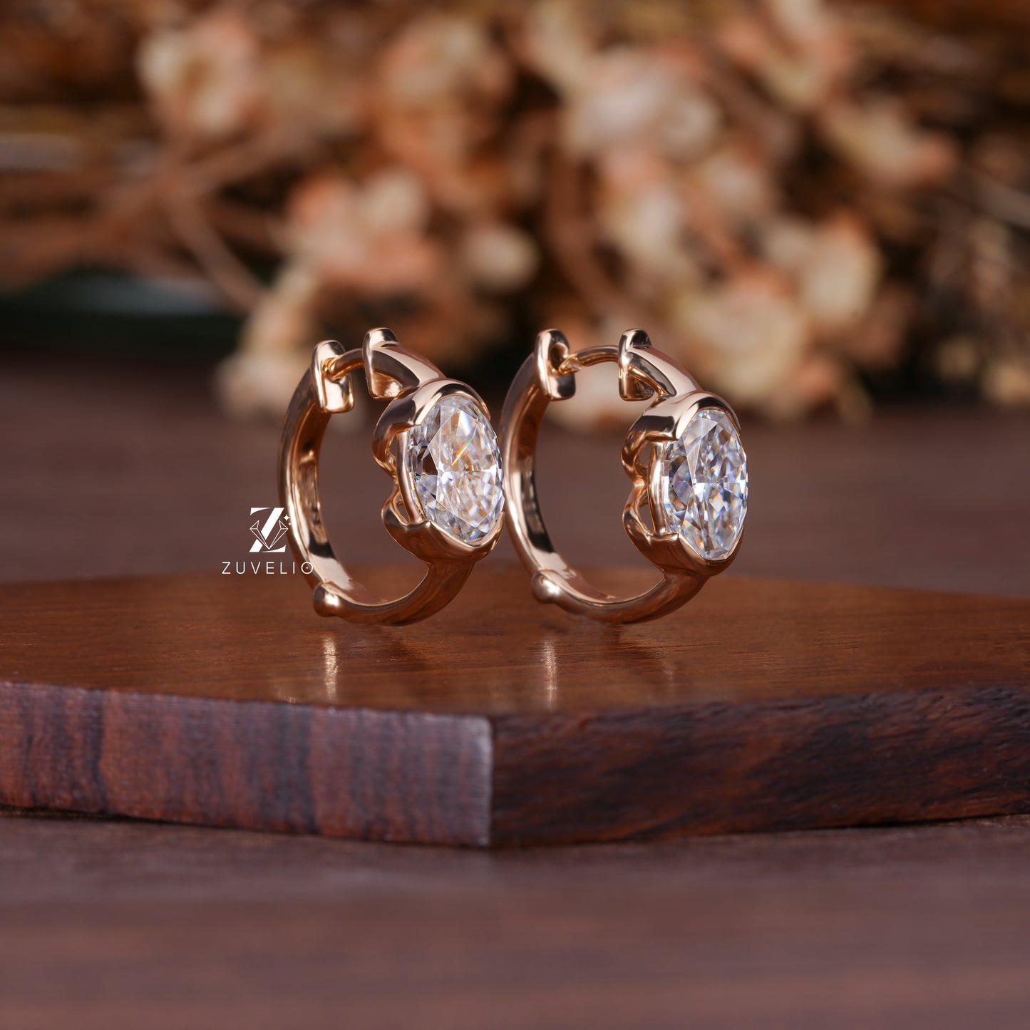 Oval Moissanite Huggie Earrings