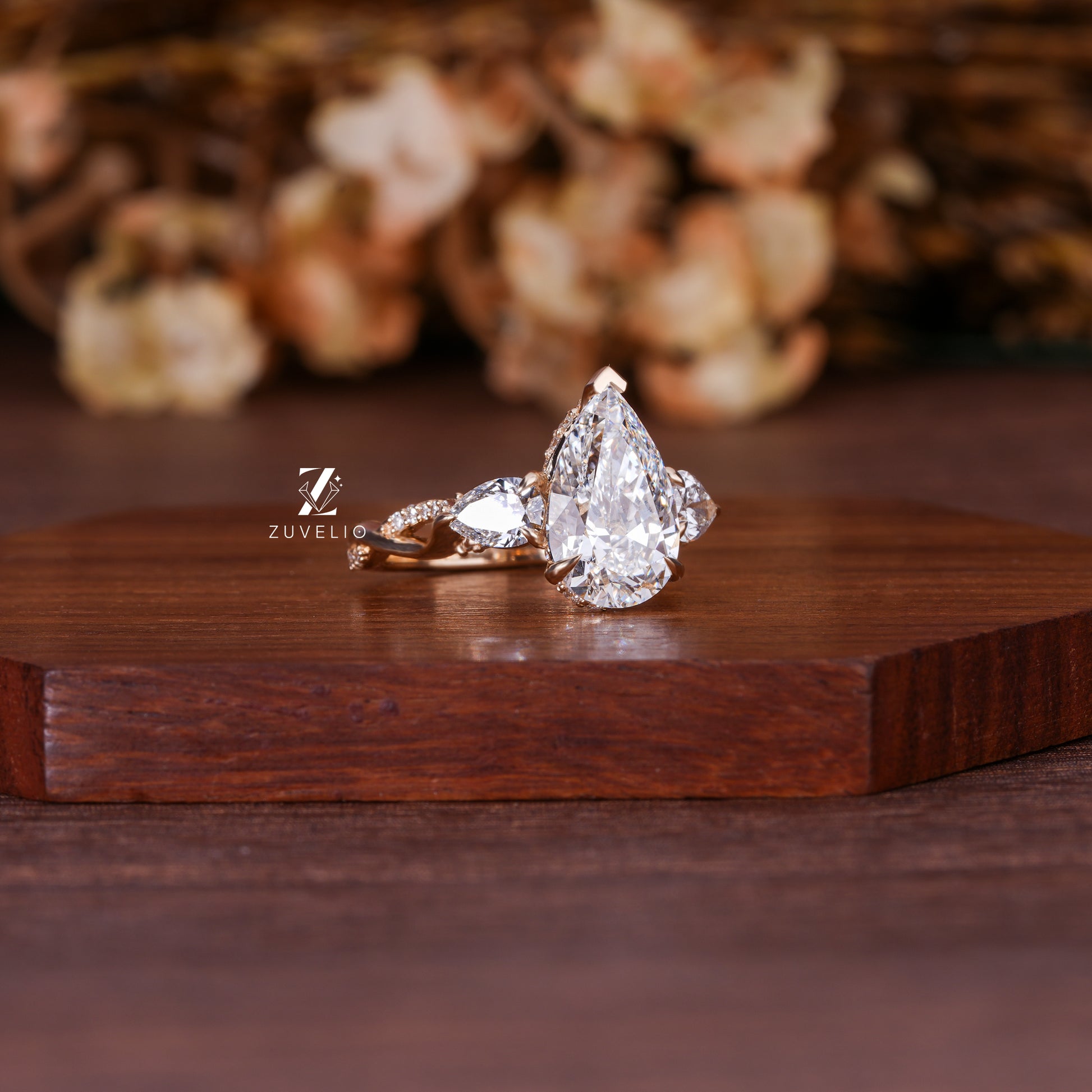 Pear Rose Gold Trilogy Diamond Ring